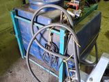 a machine that is sitting on the floor in the garage