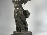 an image of a statue of an angel on a marble base