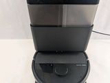 a close up of a coffee maker sitting on top of a table
