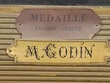 a sign that says med alle on the front of a wooden cabinet