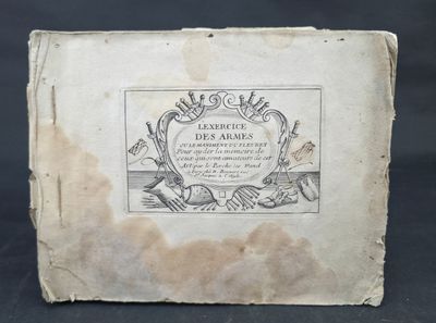 an old book with a picture of a fish on it