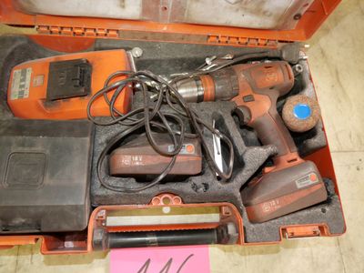a tool box with tools in it on the floor
