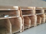 many empty wooden bins on the shelves in the store