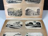 an old photo of a book with pictures of buildings and people
