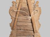 a piece of wood with a rope on top of it