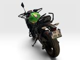 a motorcycle that is parked on a white surface