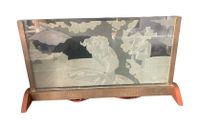 Plaque lumineuse de verre à décor d'une scène galante