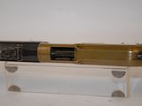 a pen that is sitting on top of a clear stand