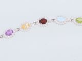a kite that is flying in the sky with many colors