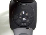 a close up of a smart phone with a button on it