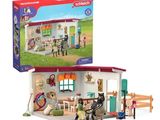 the playmobil is in the box with the horse and carriage