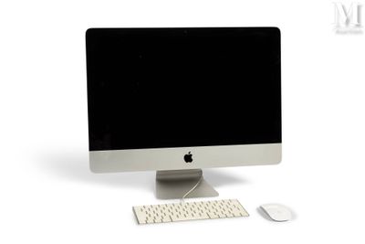 a computer monitor, keyboard, mouse and mouse on a white surface