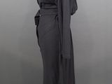 the back view of a black dress on a mannequin mannequin