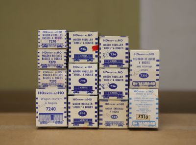 a stack of boxes that are stacked up on a table