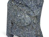 a large rock that is sitting on a white surface