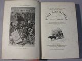 an open book with a picture of a horse drawn carriage