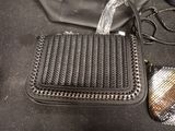 a purse and a purse bag on the ground