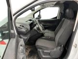 the interior of a car with the door open and the driver ' s seat down