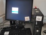 a desktop computer sitting on a desk with a keyboard and mouse