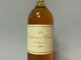 an image of a bottle of wine sitting on top of a table