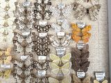 many different types of moths displayed in a shadow box