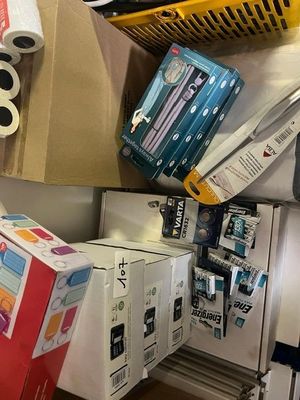 a lot of boxes that are stacked up on a shelf