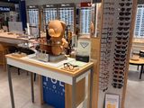 many glasses on display in the store for sale