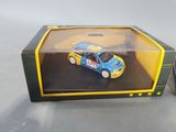 a box with a toy car inside of it on a table
