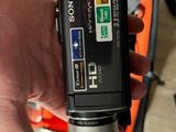 a person holding a camera in their hand