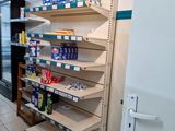 many shelves in the store that have various items on them