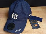 a new era yankees cap with the yankees logo on it