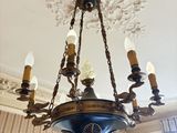 a chandelier hanging from the ceiling in a room