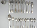 a lot of spoons and spoon spoons on the table