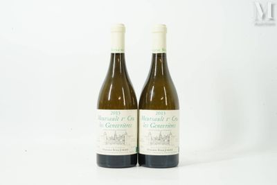 two bottles of wine sitting next to each other on a white surface