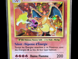 a close up of a pokemon card with a dragon on it