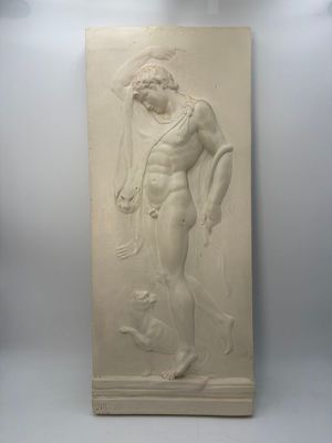 plaster sculpture of a man holding a fish