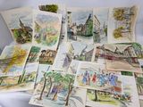 de nombreuses aquarelles posées sur une table