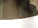 a close up of a jacket hanging on a hanger