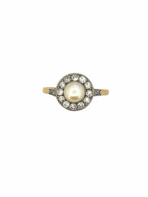 a white pearl and diamond ring on a white background