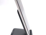 a cell phone that is sitting on a stand
