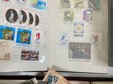 a box full of stamps sitting on top of a table