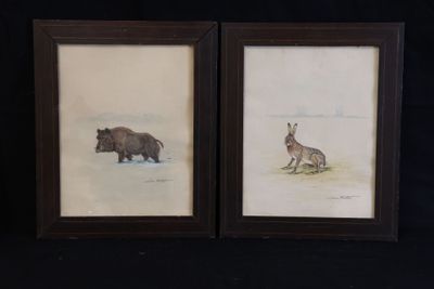 deux tableaux encadrés représentant un ours et un cerf dans un champ