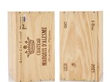 two wooden boxes with wine labels on them sitting next to each other