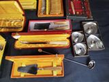 many different types of tools in a case on a table
