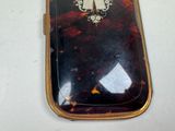 a cell phone that is sitting on a table