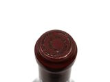 a bottle of wine that is sitting on a table