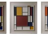three pieces of art that are on display in a white frame