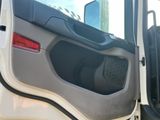 a close up of the door of a truck with the driver ' s side door open