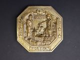 l'image d'une pièce d'or sur laquelle figure l'image d'un homme et d'une femme