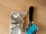 a measuring spoon and a measuring cup sitting on a table